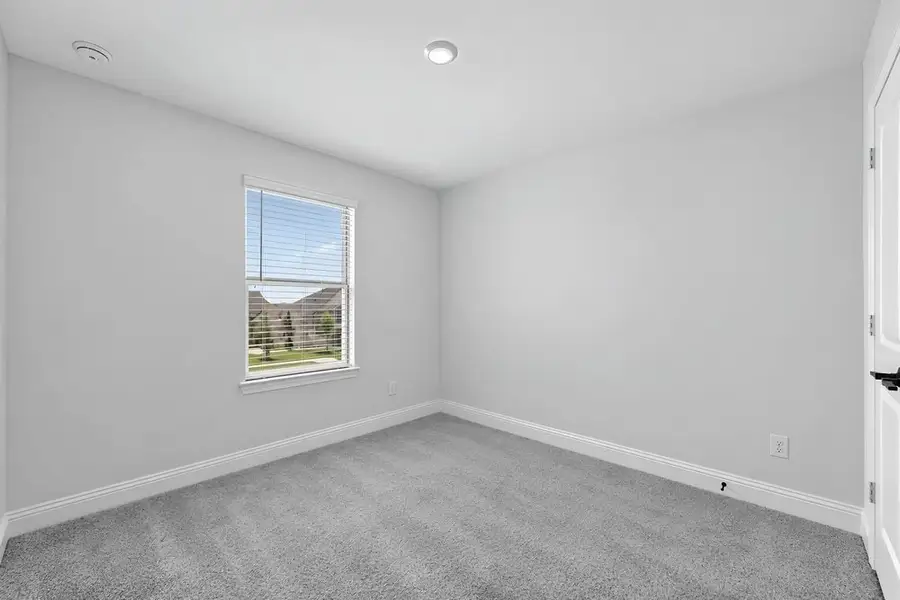 Spacious, unfurnished interior of a new home in Cross Creek Meadows, Celina (Image 24).
