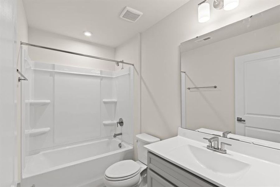 Furnished interior view inside a new home in Middle Creek Village Coastal Cottages & Villas, Bolivia (Image 6).