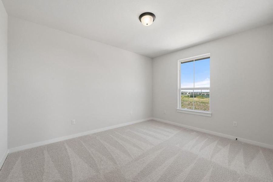 Spacious, unfurnished interior of a new home in Terrace Collection At Turner's Crossing, Buda (Image 15).