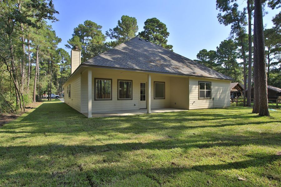 Front exterior of a new home in , Magnolia, TX, highlighting curb appeal (Image 16). Front exterior of a new home in , Magnolia, TX, highlighting curb appeal (Image 16).