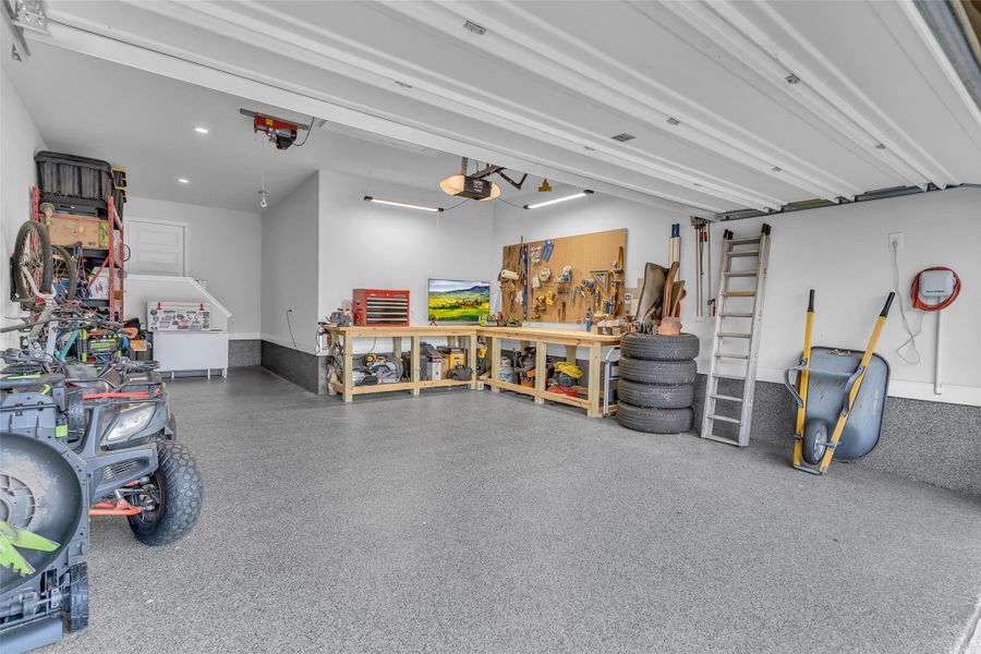 3 car tandem garage with epoxy flooring