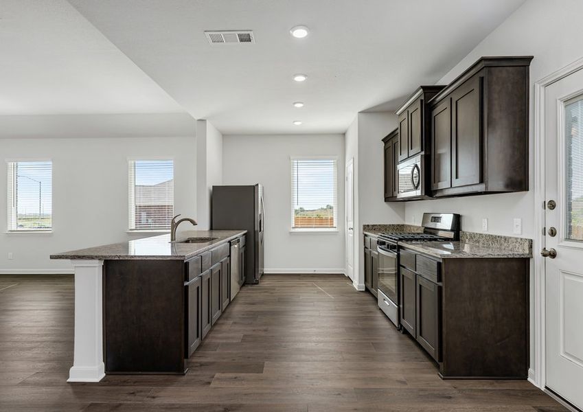 The kitchen has energy-efficient, stainless-steel appliances. The kitchen has energy-efficient, stainless-steel appliances.