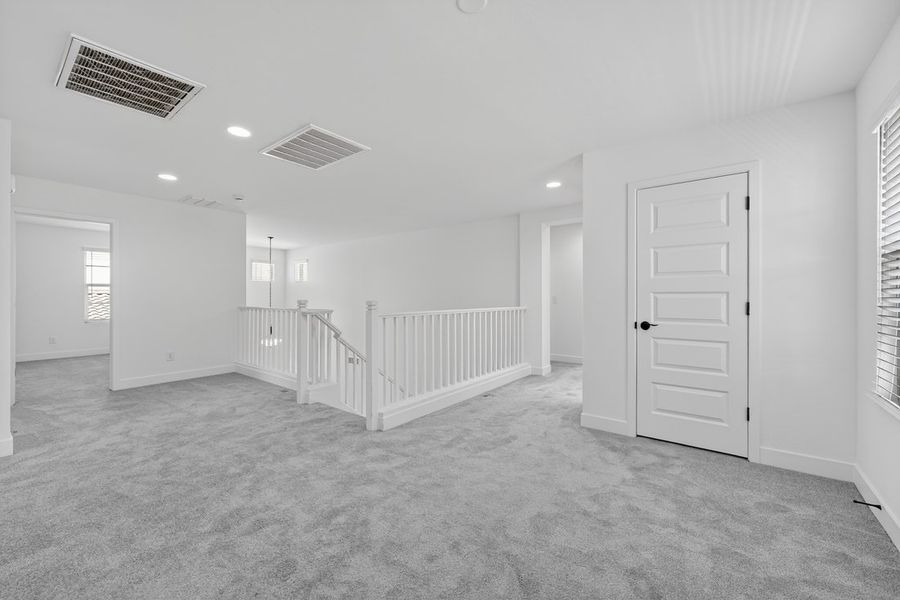 Spacious, unfurnished interior of a new home in La Mira, Mesa (Image 19). Spacious, unfurnished interior of a new home in La Mira, Mesa (Image 19).