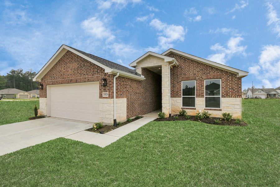 Front exterior of a new home in Grand Oaks Reserve, Cleveland, TX, highlighting curb appeal (Image 2). Front exterior of a new home in Grand Oaks Reserve, Cleveland, TX, highlighting curb appeal (Image 2).