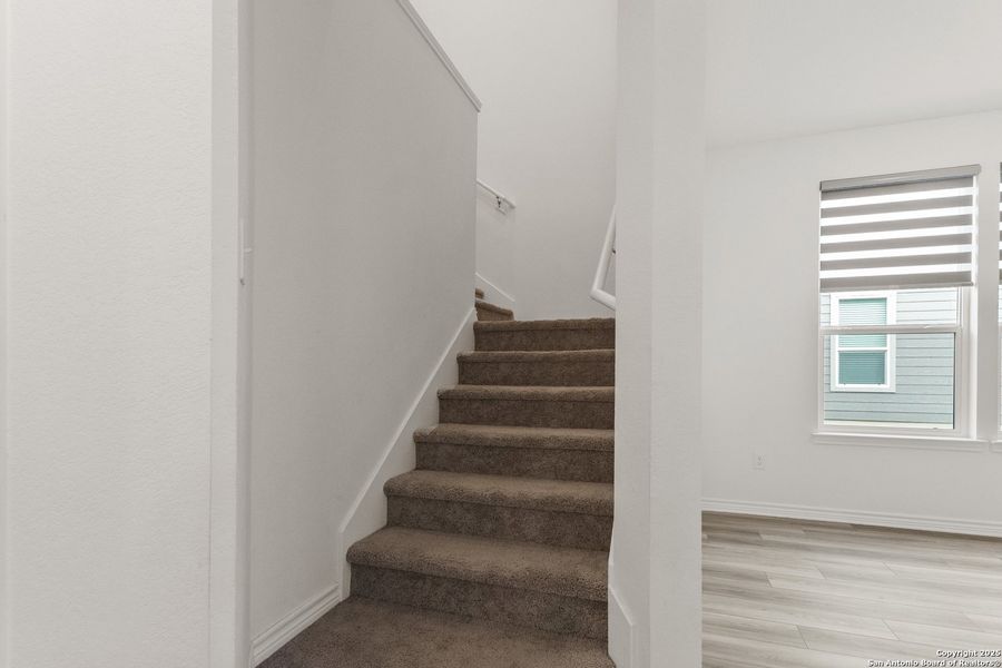 Spacious, unfurnished interior of a new home in Cove at Westover Hills, San Antonio (Image 34).