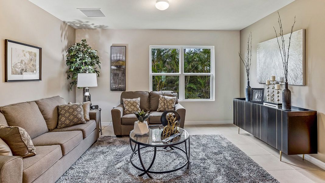 Representative furnished interior of a home built from the Cali by D.R. Horton in North Port - Express Series, North Port (Image 11).