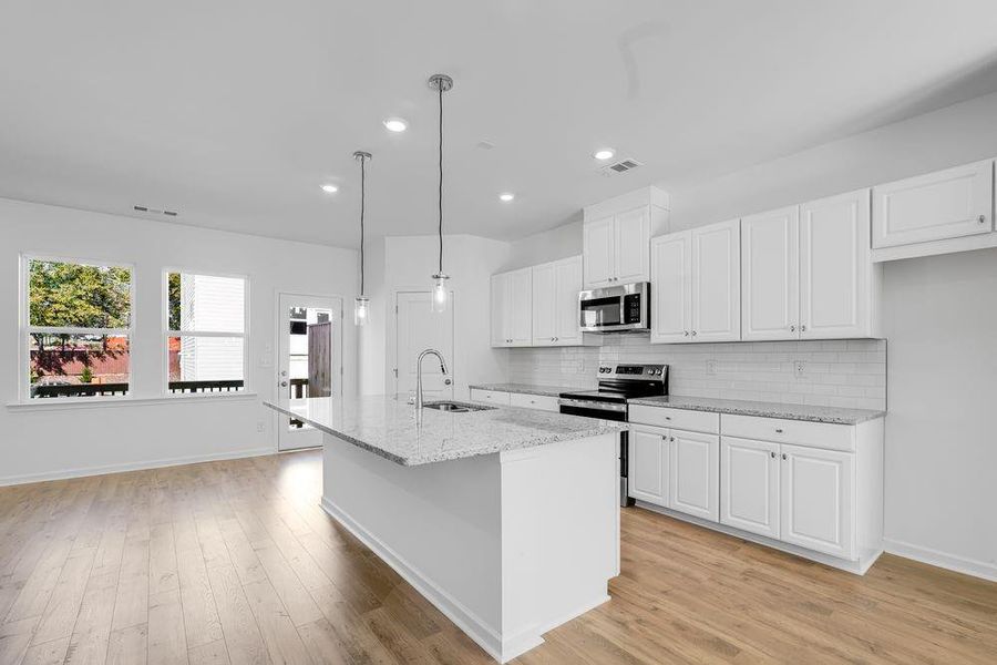 Furnished interior view inside a new home in Chandler Run, Tucker (Image 10). Furnished interior view inside a new home in Chandler Run, Tucker (Image 10).