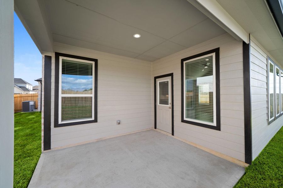 Exterior details and patio area of a home in Beacon Hill, Waller (Image 3). Exterior details and patio area of a home in Beacon Hill, Waller (Image 3).