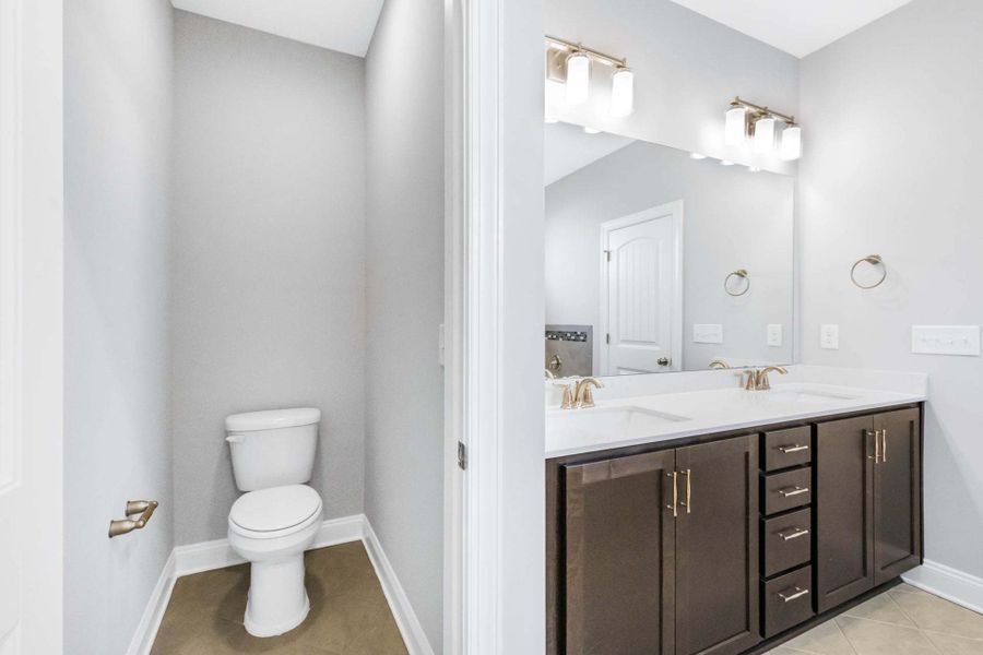 Representative furnished interior of a home built from the Clayton by Caviness & Cates Communities in Bartlett Manor, Youngsville (Image 183).