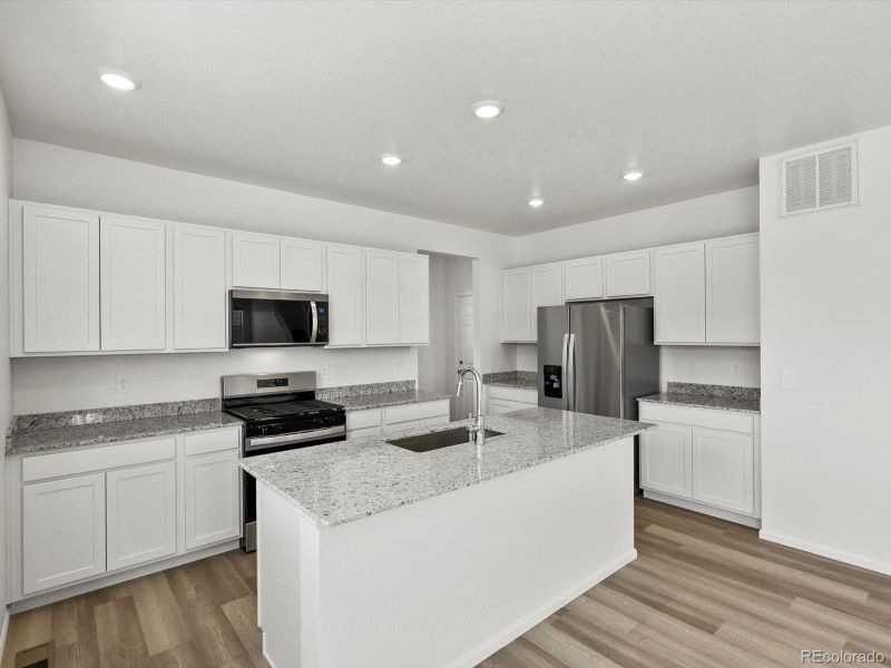 Furnished interior view inside a new home in Revere at Johnstown, Johnstown (Image 8).