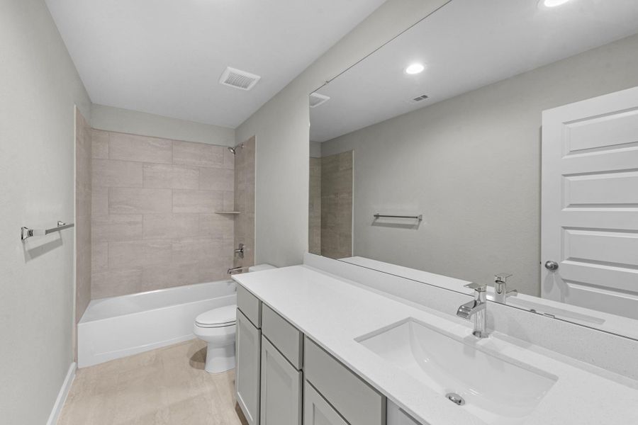 Furnished interior view inside a new home in Sunterra Lakes, Brookshire (Image 12).