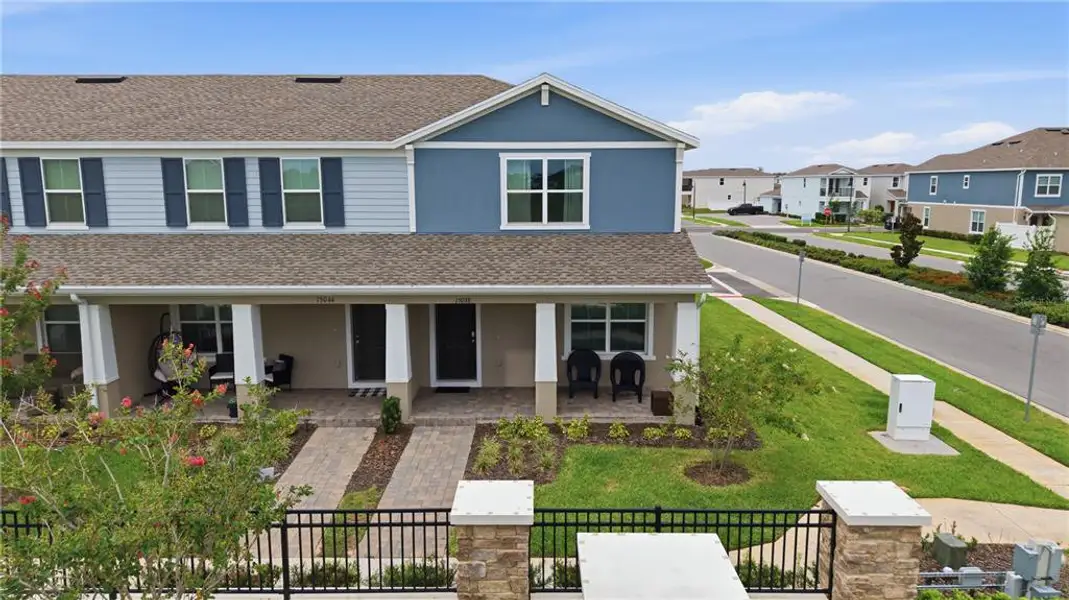 Front exterior of a new home in , Winter Garden, FL, highlighting curb appeal (Image 1). Front exterior of a new home in , Winter Garden, FL, highlighting curb appeal (Image 1).