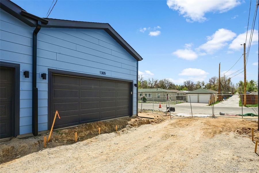 Front exterior of a new home in , Aurora, CO, highlighting curb appeal (Image 2).