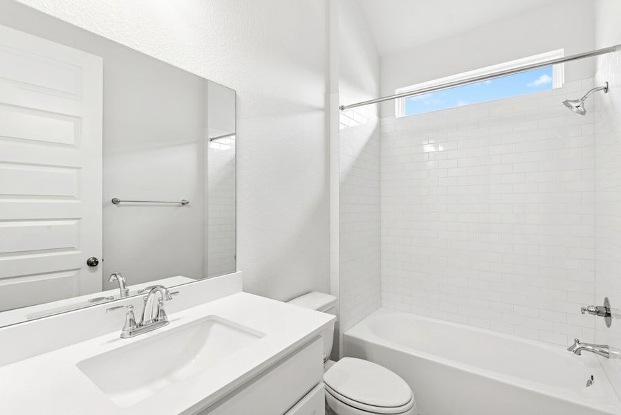 Furnished interior view inside a new home in University Heights, Round Rock (Image 15).