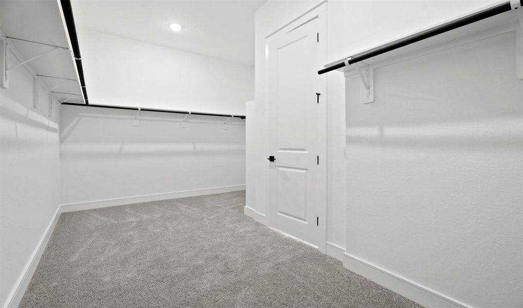 Large primary closet (*Photo not of actual home and used for illustration purposes only.) Large primary closet (*Photo not of actual home and used for illustration purposes only.)