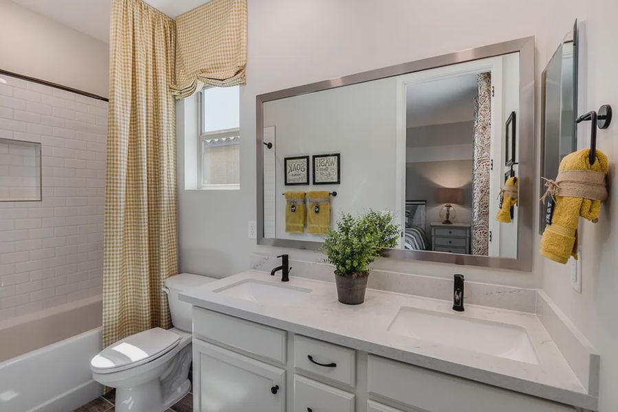 Representative furnished interior of a home built from the Crystal by Elliott Homes in Forté at Granite Vista, Waddell (Image 16).