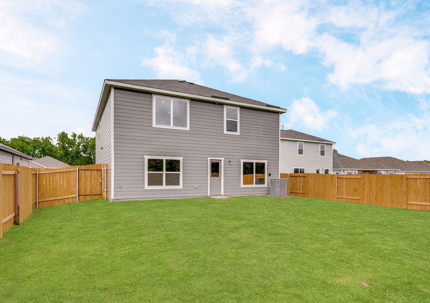 The back yard of the Driftwood is fully fenced-in.