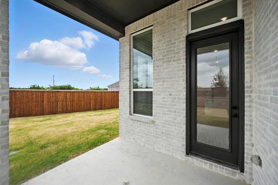 Exterior details and patio area of a home in Wellington: 50ft. lots, Haslet (Image 2).