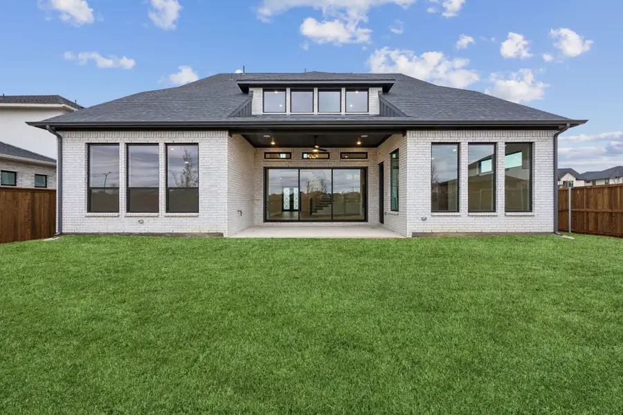 Exterior details and patio area of a home in The Grove Frisco, Frisco (Image 3).