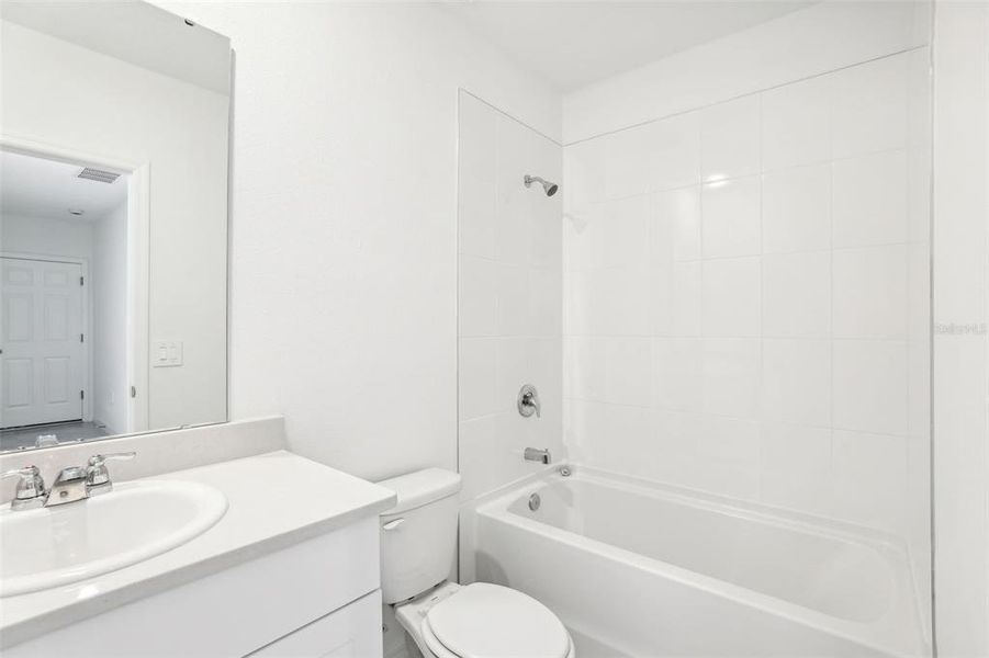 Furnished interior view inside a new home in Lake Deer Estates - Classic Series, Poinciana (Image 7).