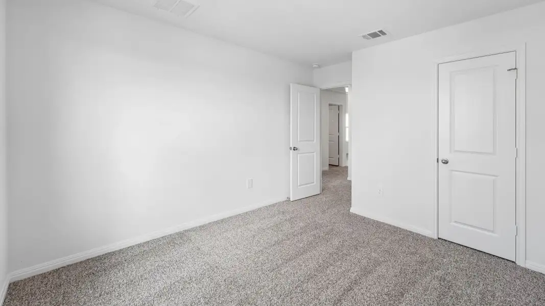 Spacious, unfurnished interior of a new home in Bar W Ranch, Leander (Image 29).