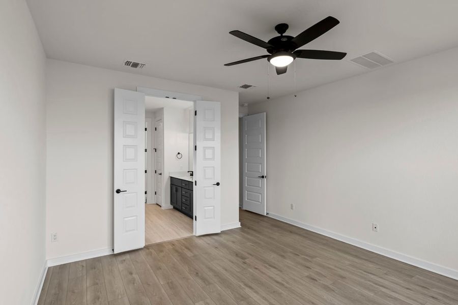 Spacious, unfurnished interior of a new home in Terrace Collection at Lariat, Liberty Hill (Image 37).