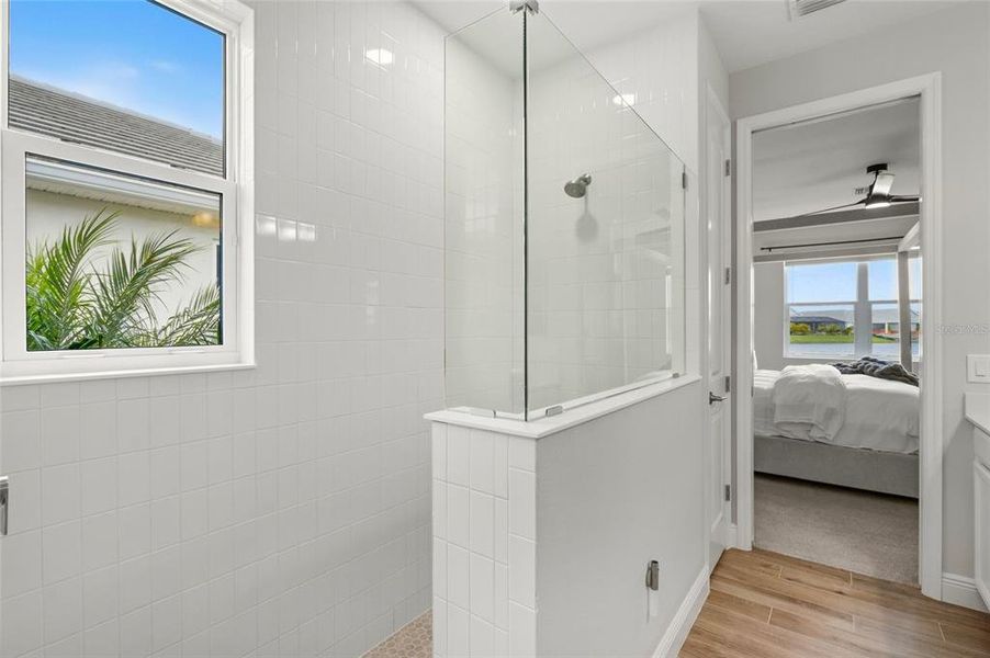 Furnished interior view inside a new home in LakeHouse Cove at Waterside, Sarasota (Image 30). Furnished interior view inside a new home in LakeHouse Cove at Waterside, Sarasota (Image 30).