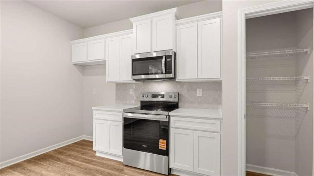 Furnished interior view inside a new home in WillowBrook, Winder (Image 9).