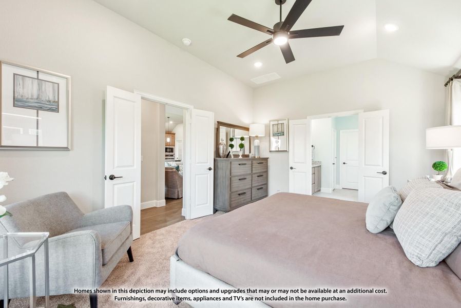 Master bedroom with vaulted ceiling, ceiling fan, and doors leading to ensuite bathroom and closet Master bedroom with vaulted ceiling, ceiling fan, and doors leading to ensuite bathroom and closet
