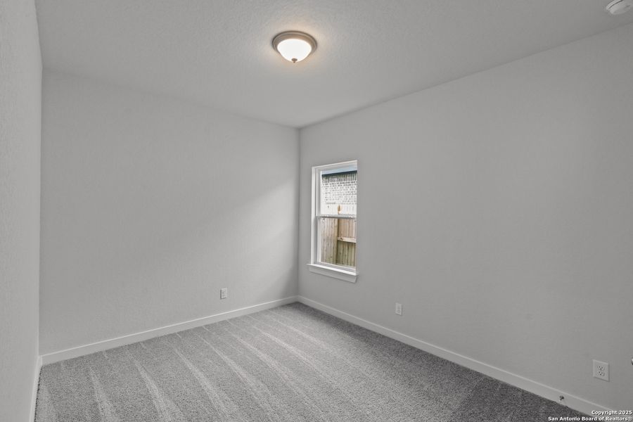 Spacious, unfurnished interior of a new home in August Fields, New Braunfels (Image 24).