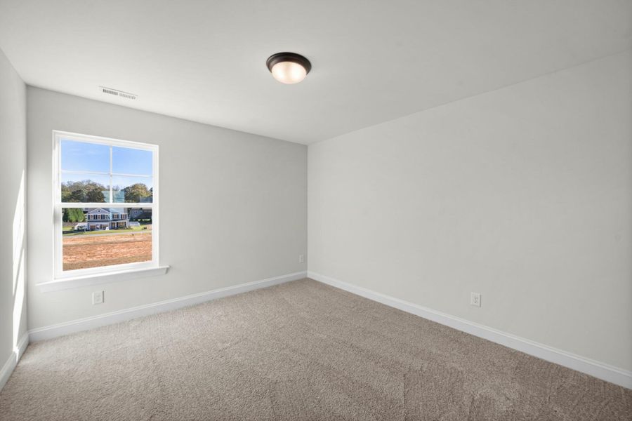 Spacious, unfurnished interior of a new home in Pisgah Park, Kernersville (Image 35).