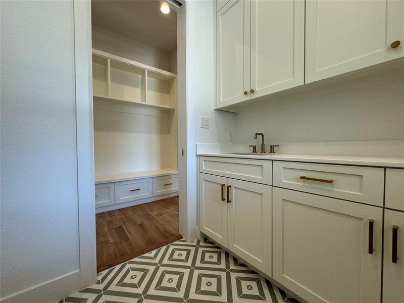 Pantry featuring sink