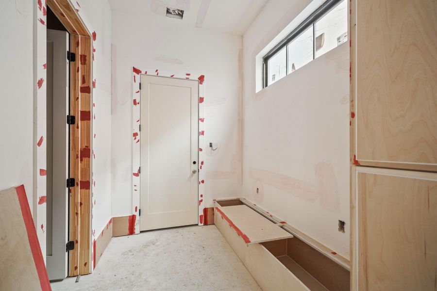 Tucked between garage and kitchen is this convenient mudroom!
