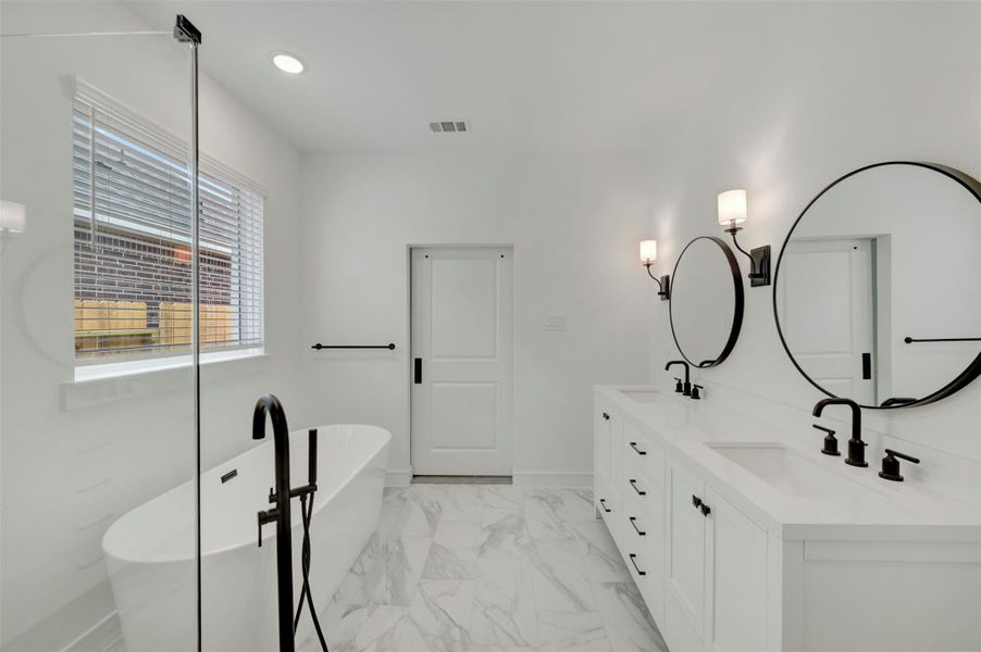 Luxurious primary bath (*Photo not of actual home and used for illustration purposes only.) Luxurious primary bath (*Photo not of actual home and used for illustration purposes only.)