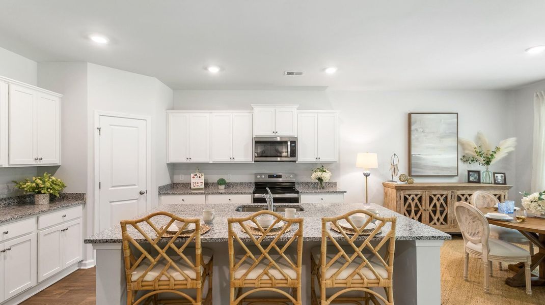 Furnished interior view inside a new home in Pine Hills at Cane Bay, Summerville (Image 2).