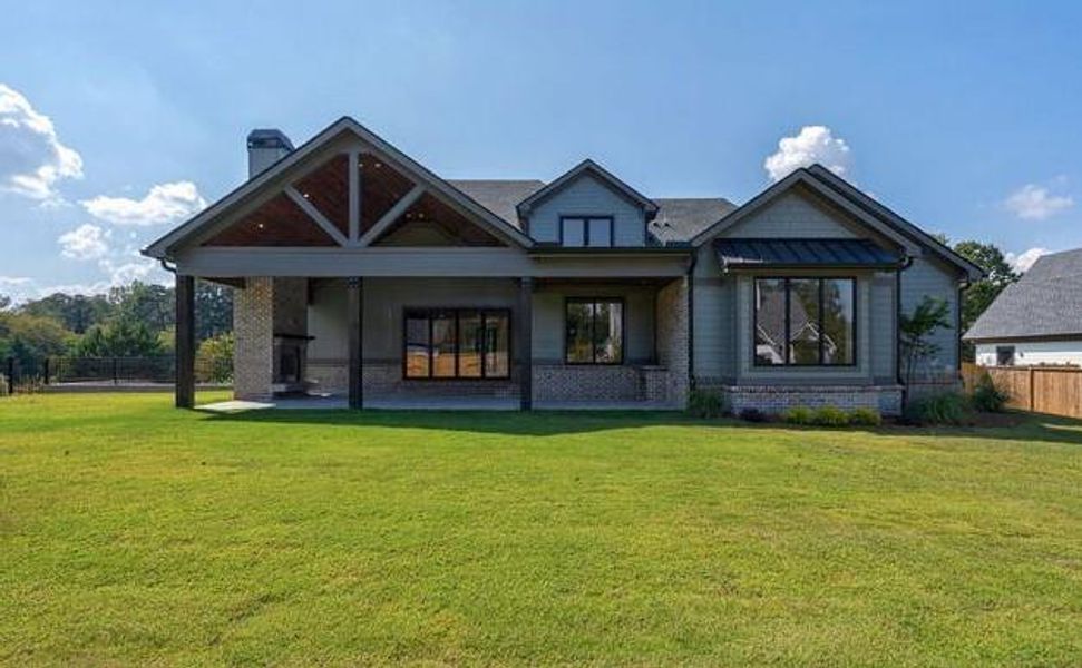 Front exterior of a new home in , Cumming, GA, highlighting curb appeal (Image 31).