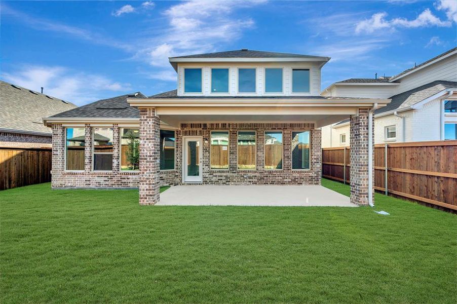 Exterior details and patio area of a home in Lily Creek at Sutton Fields, Aubrey (Image 3).