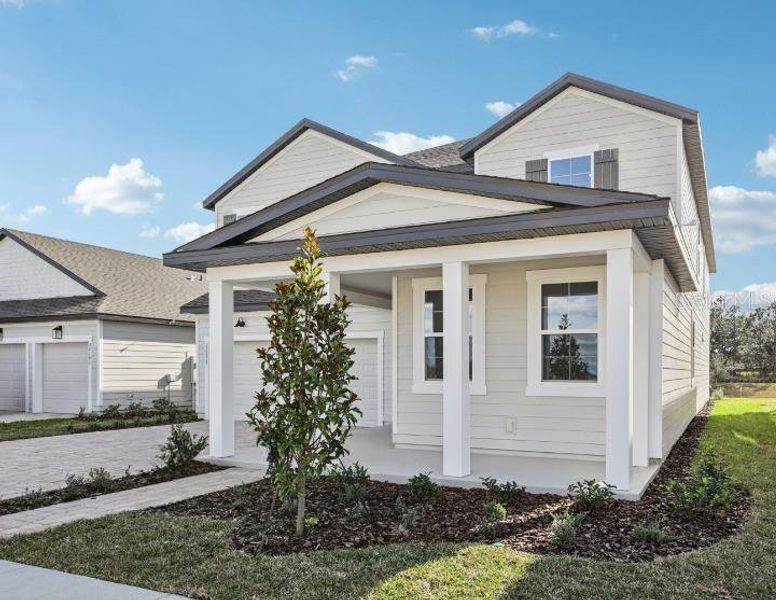 Front exterior of a new home in , Mount Dora, FL, highlighting curb appeal (Image 23).