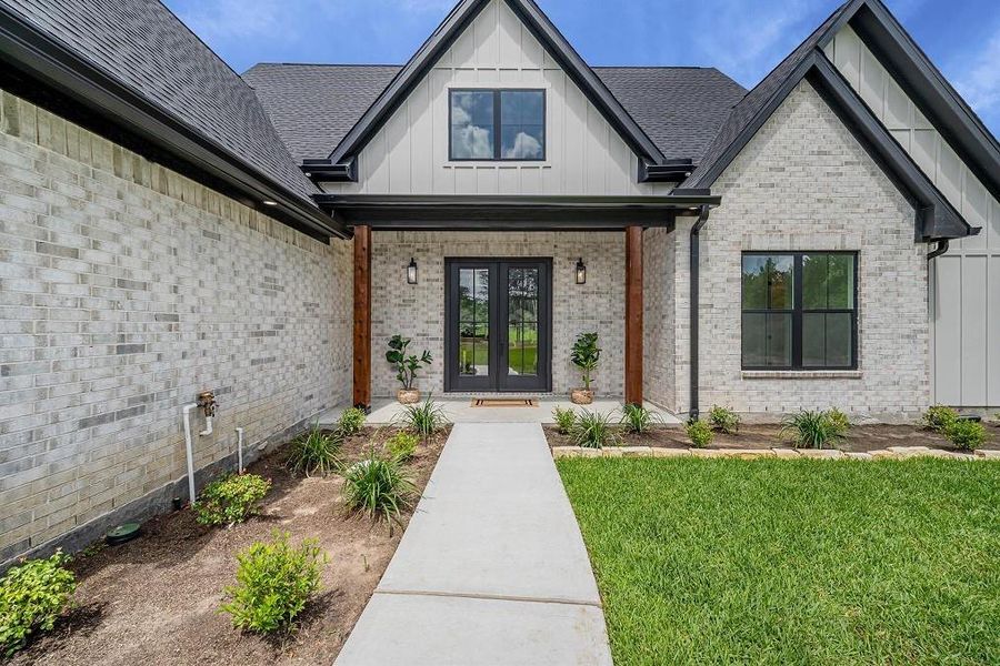 Exterior details and patio area of a home in , Conroe (Image 27). Exterior details and patio area of a home in , Conroe (Image 27).