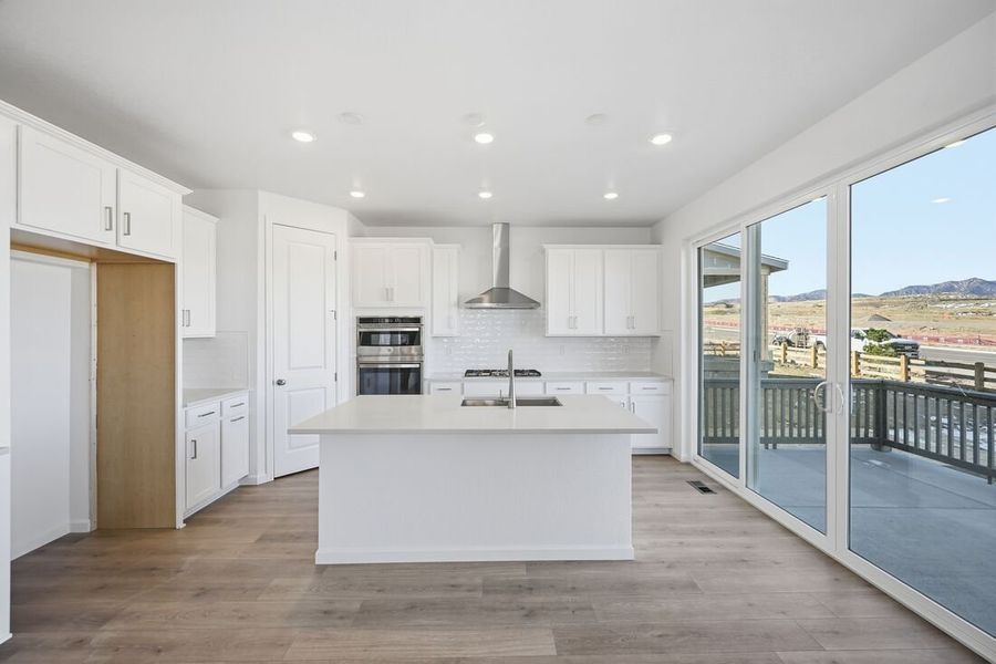 Furnished interior view inside a new home in Trailstone Town Collection, Arvada (Image 6).