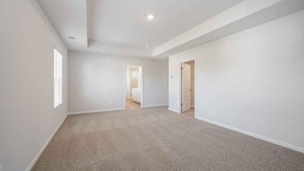 Spacious, unfurnished interior of a new home in The Reserve at Calcutta, Stockbridge (Image 29).