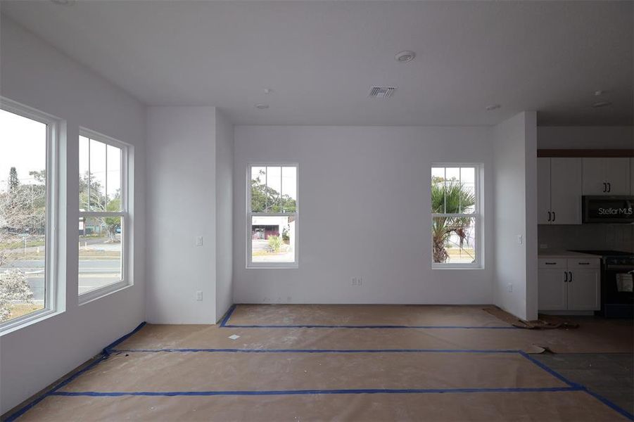 In-progress construction of a new home in Towns at Union, St. Petersburg, FL (Image 11).