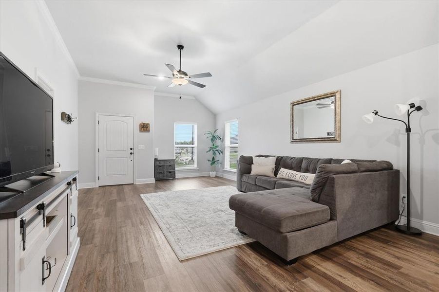The entryway opens directly into the spacious living area, creating an inviting and open flow throughout the home.