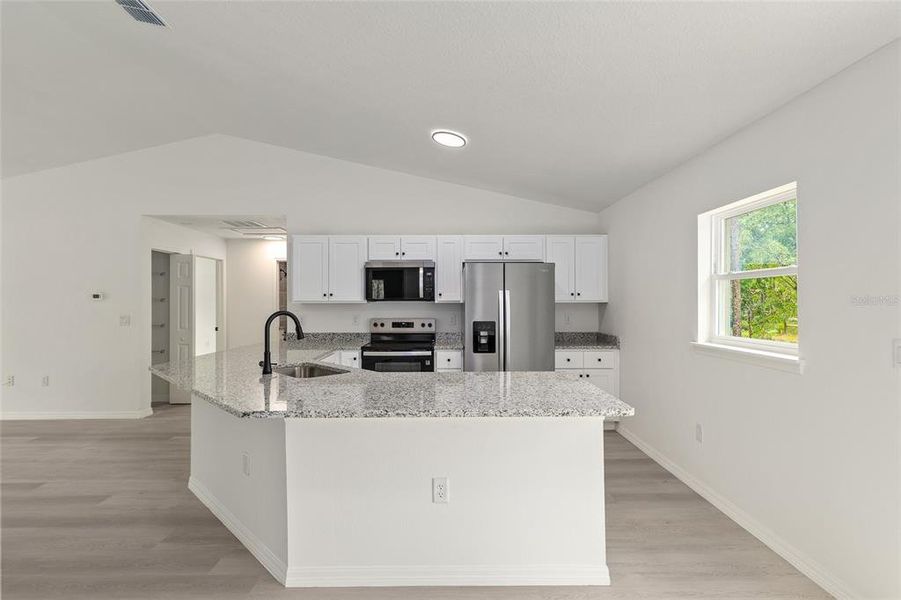 Furnished interior view inside a new home in , Dunnellon (Image 9).