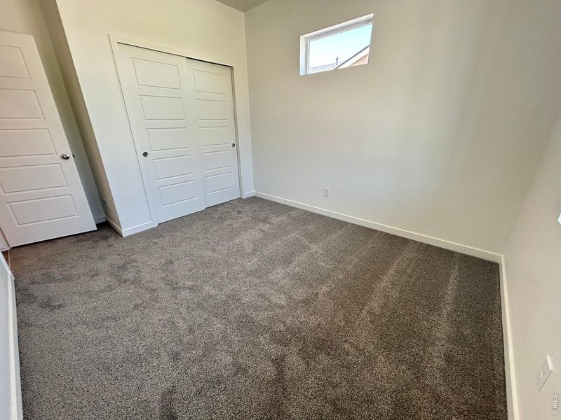 Spacious, unfurnished interior of a new home in Union Colony West, Greeley (Image 7).
