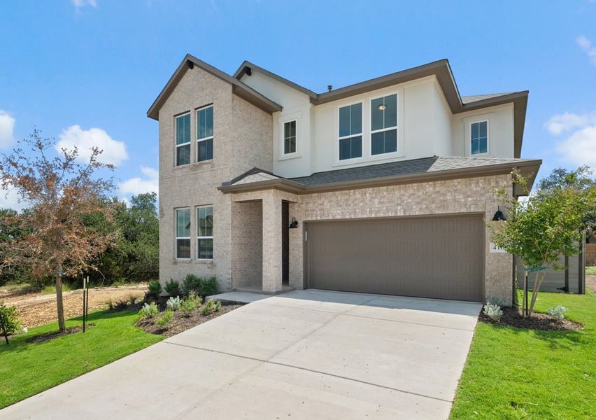 Front exterior of a new home in Arbor Collection At Wolf Ranch, Georgetown, TX, highlighting curb appeal (Image 20).