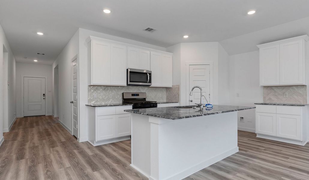Representative furnished interior of a home built from the Cali by D.R. Horton in Caldwell Crossing, Iowa Colony (Image 4). Representative furnished interior of a home built from the Cali by D.R. Horton in Caldwell Crossing, Iowa Colony (Image 4).