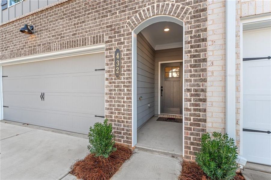 Exterior details and patio area of a home in River Walk Place, Lawrenceville (Image 1).