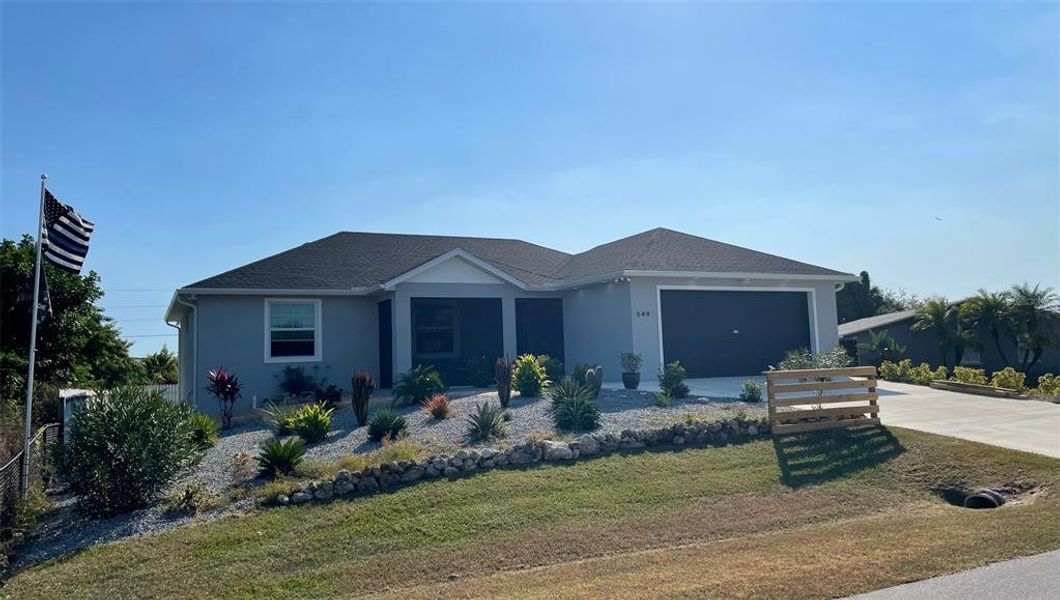 Front exterior of a new home in , Port Charlotte, FL, highlighting curb appeal (Image 27). Front exterior of a new home in , Port Charlotte, FL, highlighting curb appeal (Image 27).