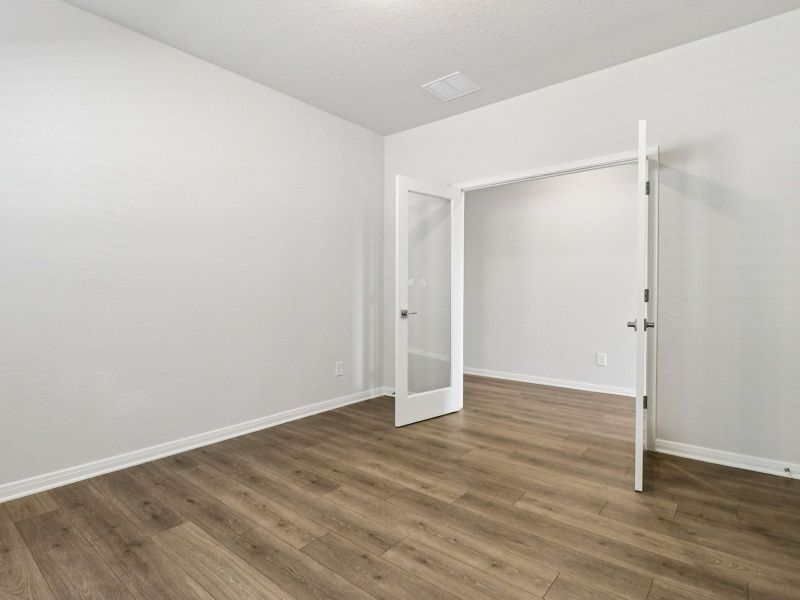 Spacious, unfurnished interior of a new home in Estancia Ranch - Classic Series, San Antonio (Image 13).